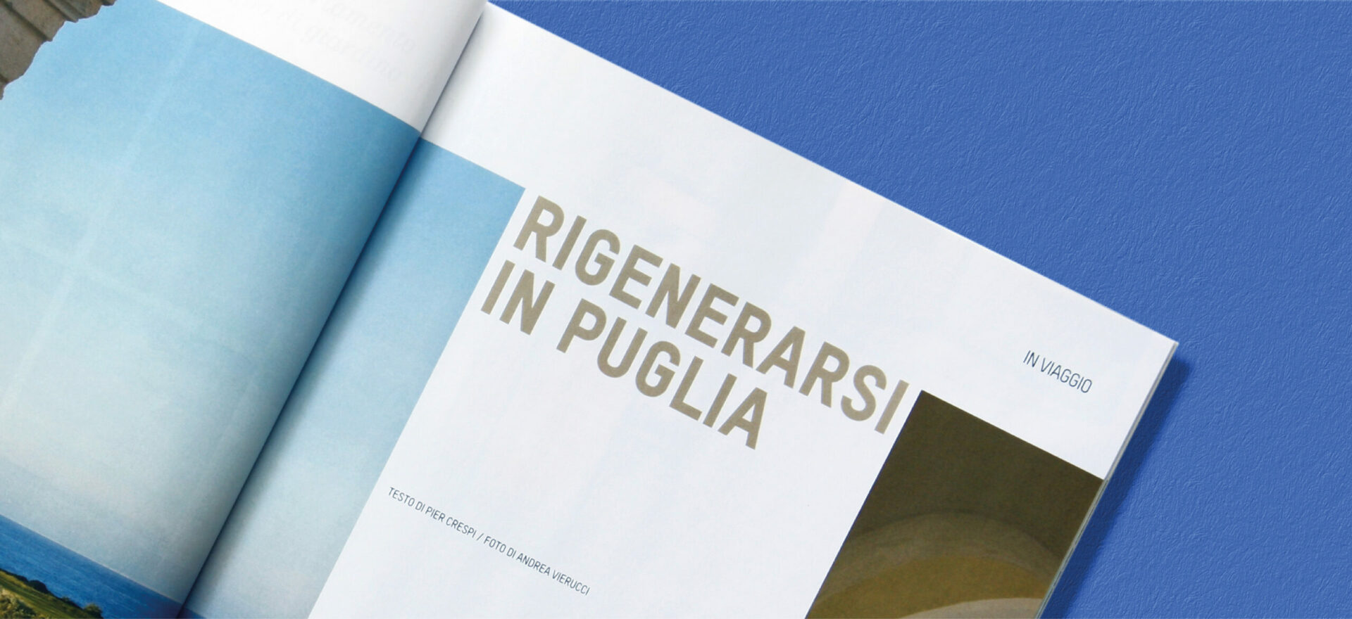 Close up photo of an opened Ville Giardini Magazine showing detail of the typography and composition of text and images used in the project of the Art Direction and Graphic Design for Visibilia Editore in a light blue background.